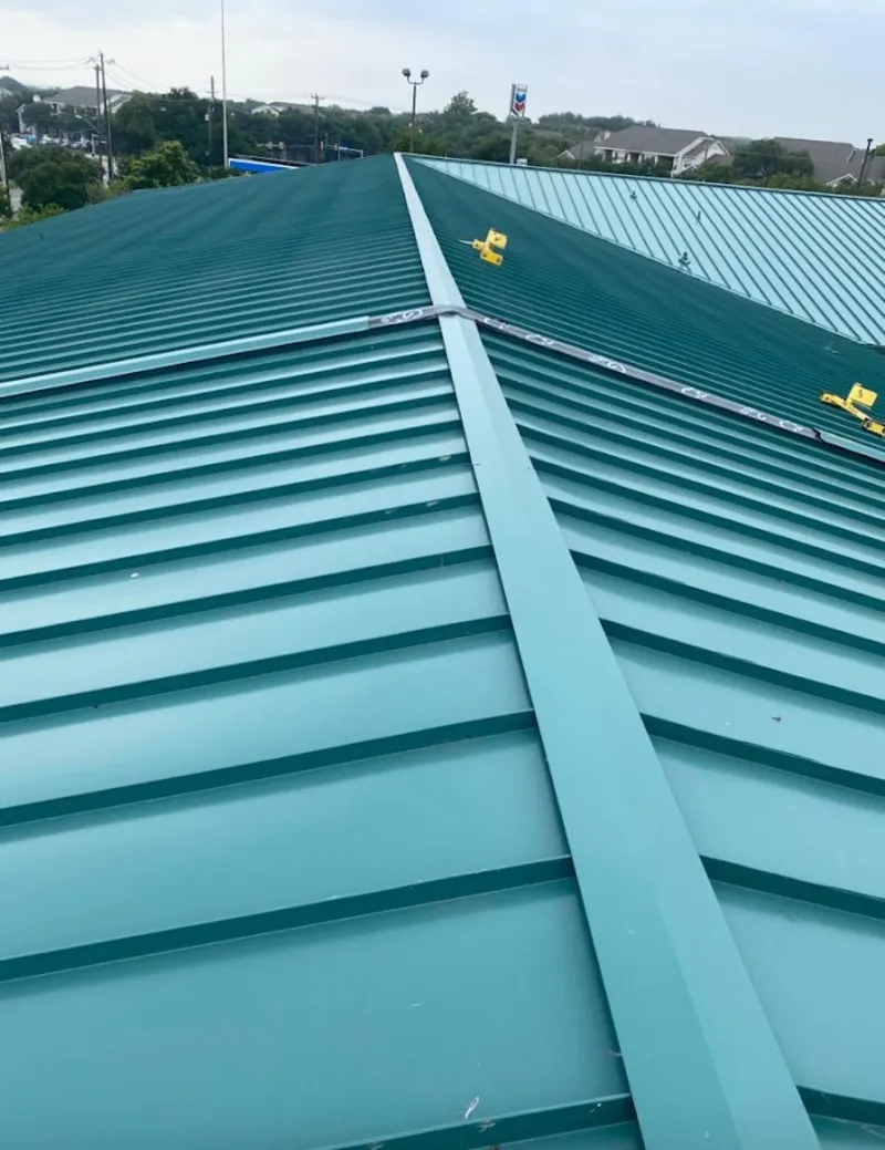 Green commercial metal roof ridge and valley for Metal Roof Repair in Bryans Road